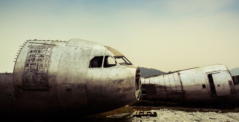 Stripped fuselage sections of an end-of-life aircraft in desert storage